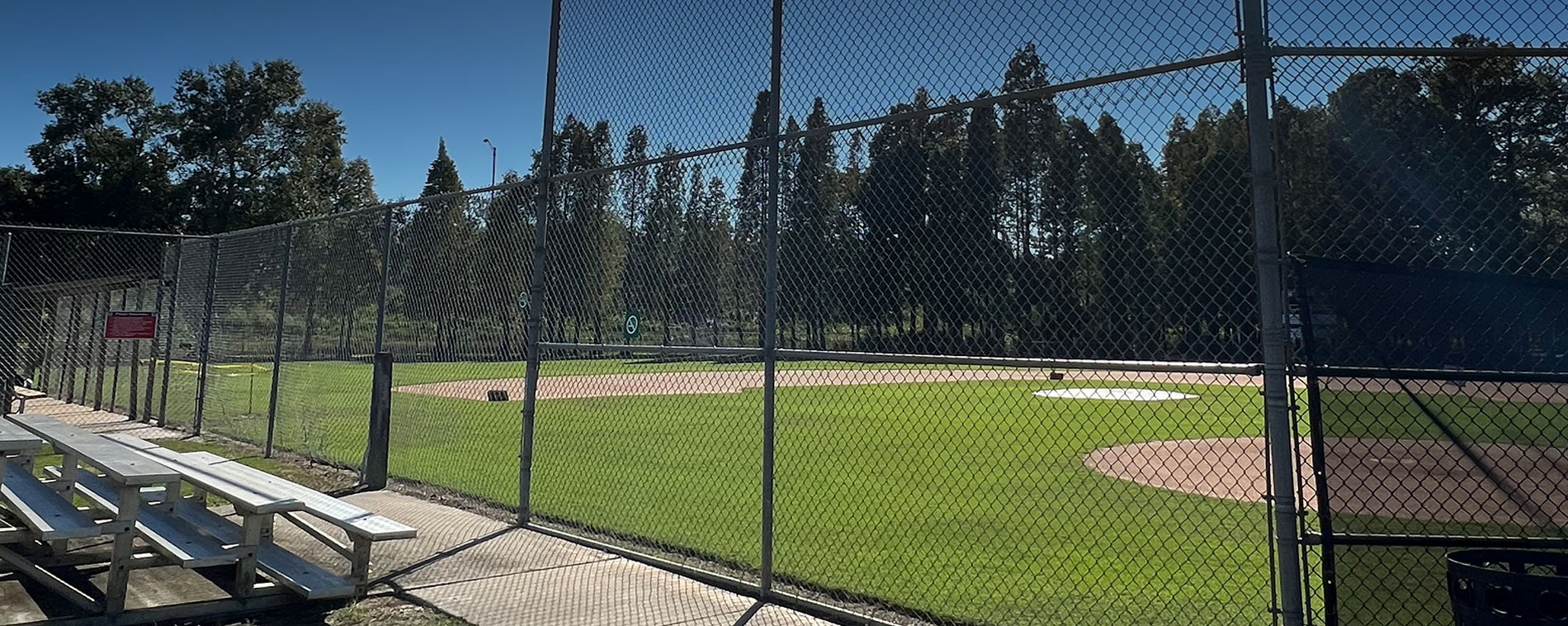 Home page header image or fence with baseball field in the background