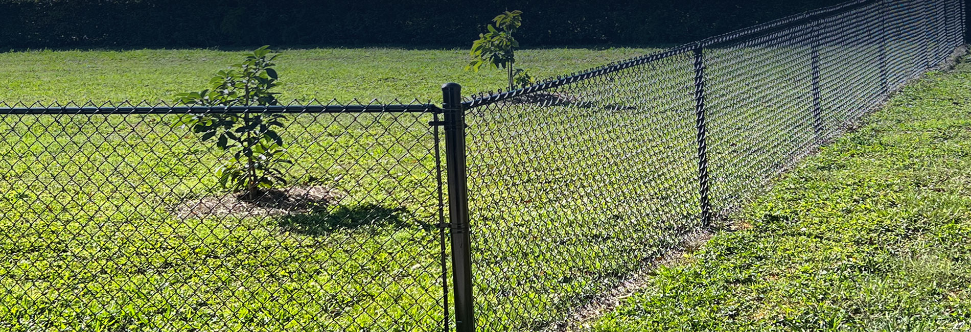 Black Residential Tube with chain link fence